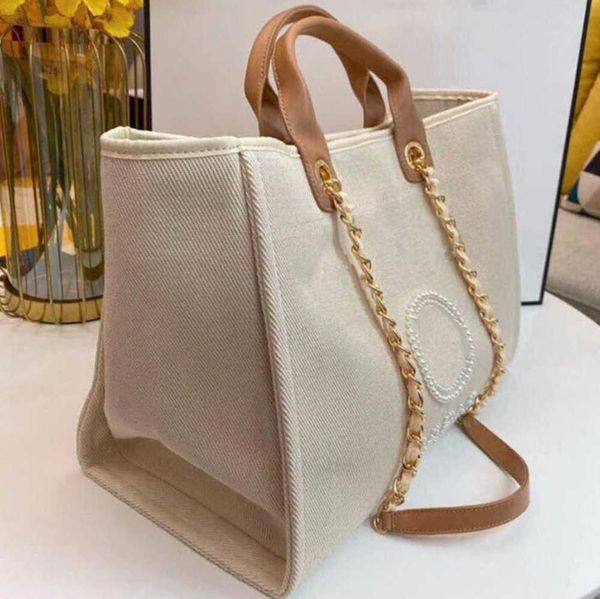women's luxury fashion beach bags pearl hand bag brand designers women tote evening handbag large capacity female backpacks small porta
women's luxury fashion beach bags pearl hand bag brand designers women tote evening handbag large capacity female backpacks small porta