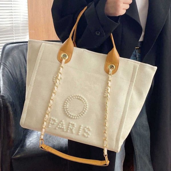 women's luxury fashion beach bags pearl hand bag brand cc designers women tote evening handbag large capacity female backpacks small po
women's luxury fashion beach bags pearl hand bag brand cc designers women tote evening handbag large capacity female backpacks small po