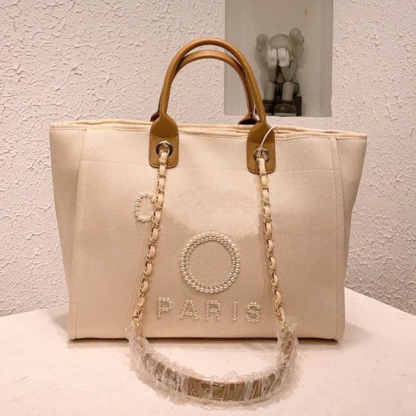 women's luxury fashion beach bags pearl hand bag brand cc designers women tote evening handbag large capacity female backpacks small po
women's luxury fashion beach bags pearl hand bag brand cc designers women tote evening handbag large capacity female backpacks small po