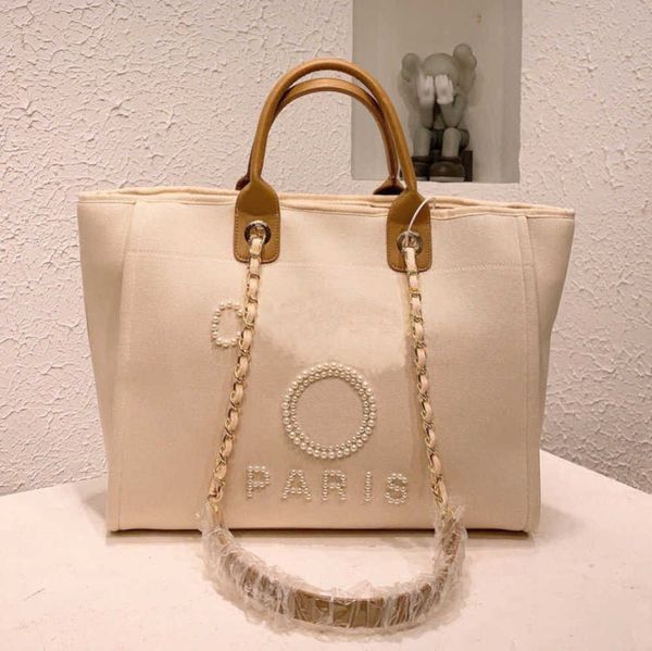 women's luxury fashion beach bags pearl hand bag brand designers women tote evening handbag large capacity female backpacks small porta
women's luxury fashion beach bags pearl hand bag brand designers women tote evening handbag large capacity female backpacks small porta
