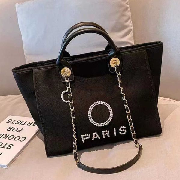women's fashion luxury beach bags pearl hand bag brand cc designers women tote evening handbag large capacity female backpacks small po
women's fashion luxury beach bags pearl hand bag brand cc designers women tote evening handbag large capacity female backpacks small po