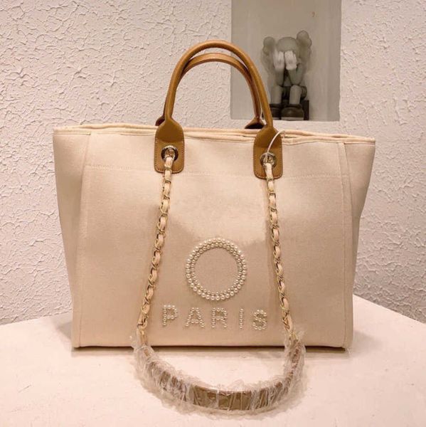 fashion luxury women's beach bags pearl hand bag brand cc designers women tote evening handbag large capacity female backpacks small po
fashion luxury women's beach bags pearl hand bag brand cc designers women tote evening handbag large capacity female backpacks small po