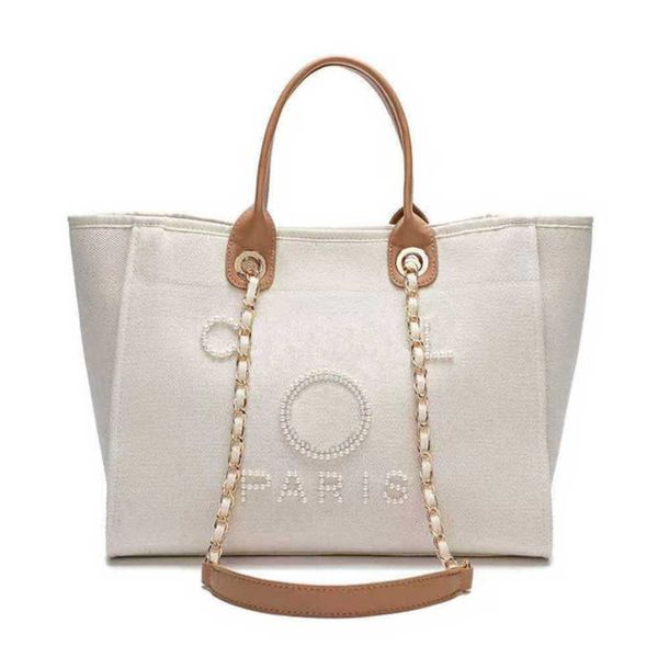 women's classic luxury evening bags pearl beach handbag brand designers women tote bag large capacity female backpack small portable pa
women's classic luxury evening bags pearl beach handbag brand designers women tote bag large capacity female backpack small portable pa