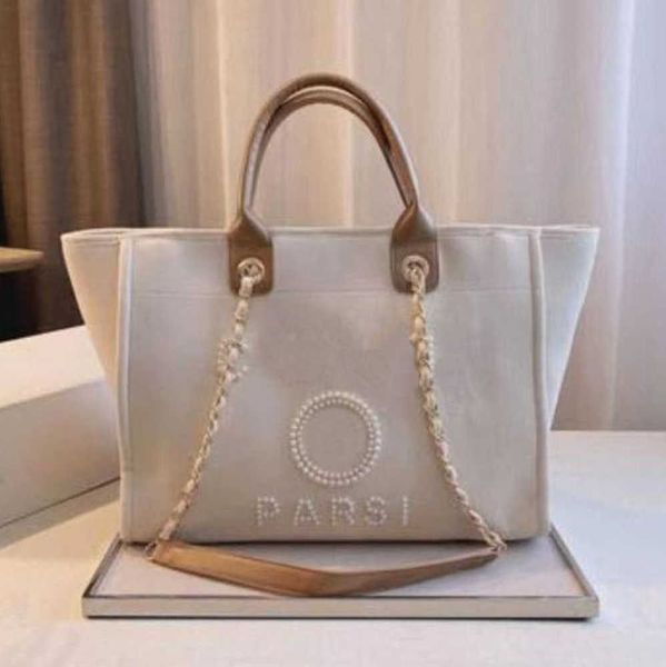 luxury women's fashion beach bags pearl hand bag brand cc designers women tote evening handbag large capacity female backpacks small po
luxury women's fashion beach bags pearl hand bag brand cc designers women tote evening handbag large capacity female backpacks small po