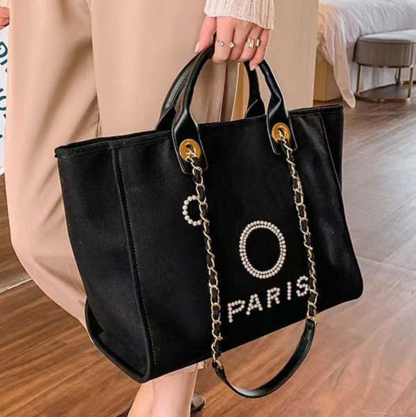 luxury fashion women's beach bags pearl hand bag brand cc designers women tote evening handbag large capacity female backpacks small po
luxury fashion women's beach bags pearl hand bag brand cc designers women tote evening handbag large capacity female backpacks small po