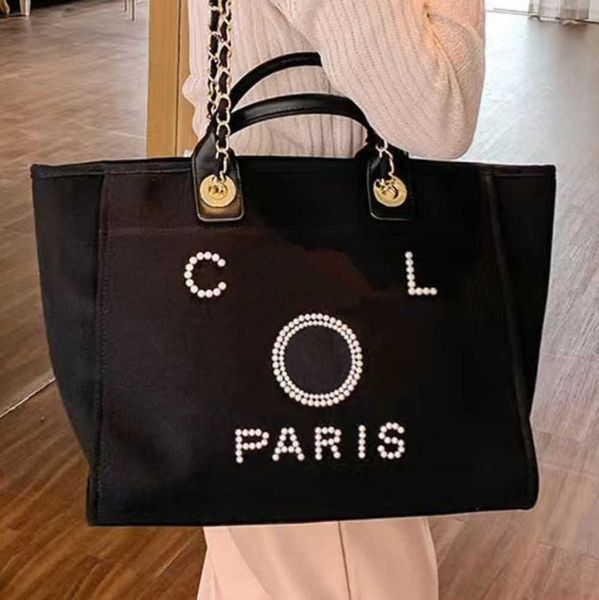 luxury women's fashion beach bags pearl hand bag brand cc designers women tote evening handbag large capacity female backpacks small po
luxury women's fashion beach bags pearl hand bag brand cc designers women tote evening handbag large capacity female backpacks small po
