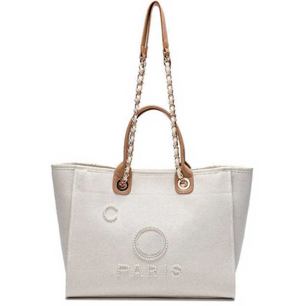 luxury fashion women's beach bags pearl hand bag brand designers women tote evening handbag large capacity female backpacks small porta
luxury fashion women's beach bags pearl hand bag brand designers women tote evening handbag large capacity female backpacks small porta