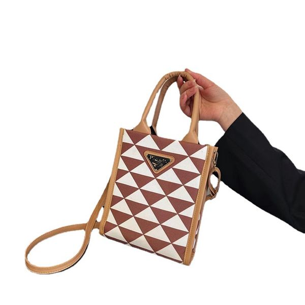 designer bags triangle type piano score handbag for women one shoulder crossbody bag letter square bags wholesale 
designer bags triangle type piano score handbag for women one shoulder crossbody bag letter square bags wholesale
