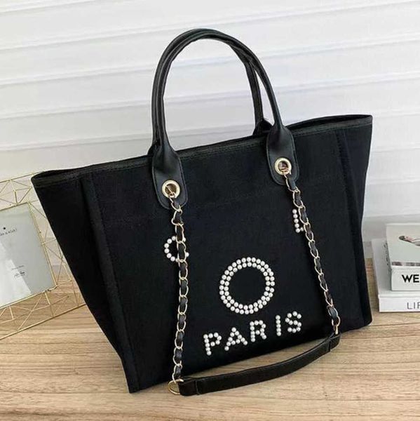 luxury women's classic evening bags pearl beach handbag brand cc designers women tote bag large capacity female backpack small portable
luxury women's classic evening bags pearl beach handbag brand cc designers women tote bag large capacity female backpack small portable