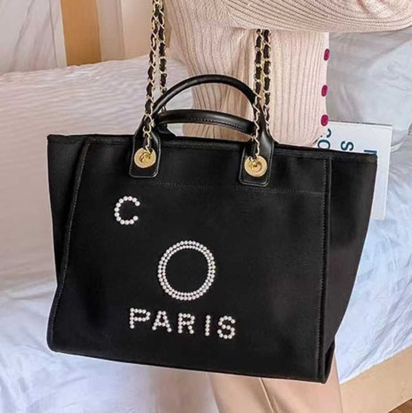 fashion women's luxury beach bags pearl hand bag brand cc designers women tote evening handbag large capacity female backpacks small po
fashion women's luxury beach bags pearl hand bag brand cc designers women tote evening handbag large capacity female backpacks small po