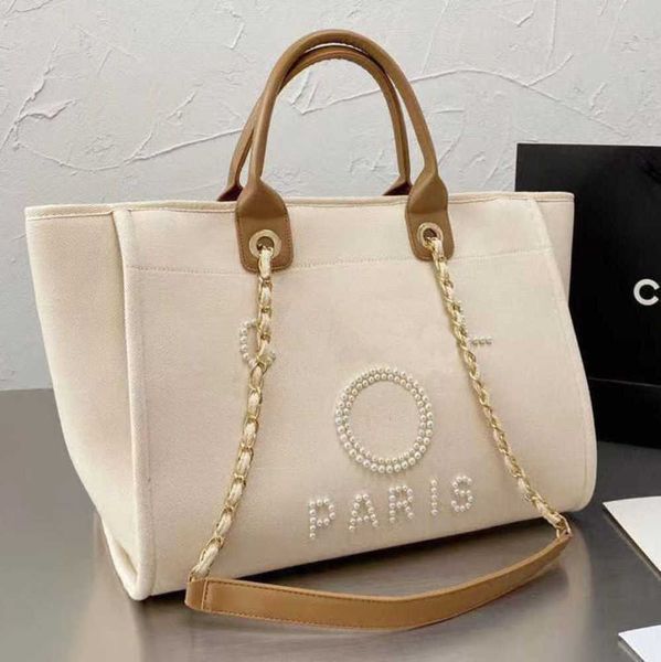 luxury women's classic evening bags pearl beach handbag brand cc designers women tote bag large capacity female backpack small portable, Black;red
luxury women's classic evening bags pearl beach handbag brand cc designers women tote bag large capacity female backpack small portable, Black;red