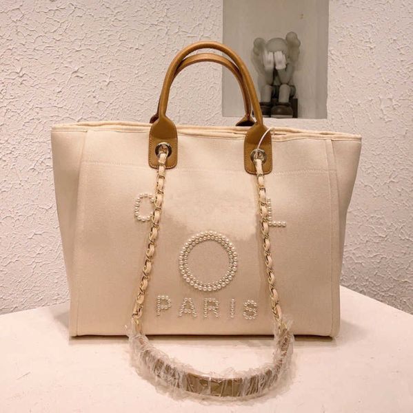 women's classic luxury evening bags pearl beach handbag brand cc designers women tote bag large capacity female backpack small portable
women's classic luxury evening bags pearl beach handbag brand cc designers women tote bag large capacity female backpack small portable