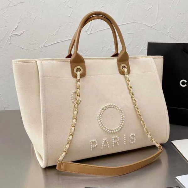 women's luxury fashion beach bags pearl hand bag brand cc designers women tote evening handbag large capacity female backpacks small po
women's luxury fashion beach bags pearl hand bag brand cc designers women tote evening handbag large capacity female backpacks small po