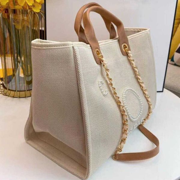 luxury fashion women's beach bags pearl hand bag brand designers women tote evening handbag large capacity female backpacks small porta
luxury fashion women's beach bags pearl hand bag brand designers women tote evening handbag large capacity female backpacks small porta