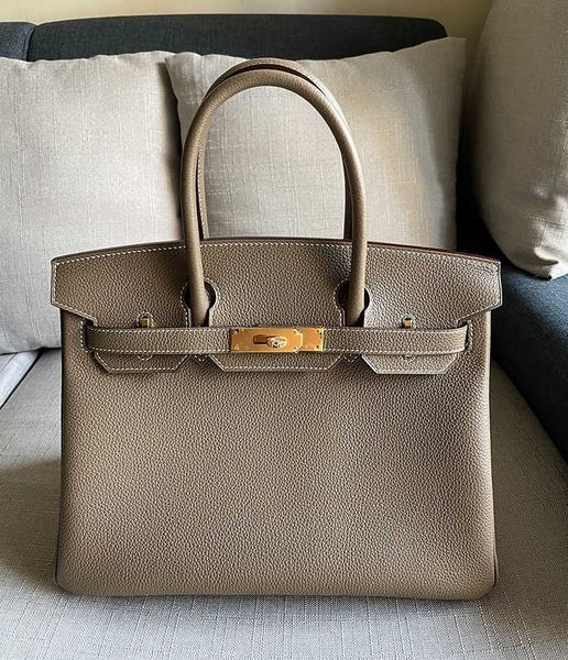 original h ermes brikis's tote bags wholesale hand sewn bag 30cm lychee patterned layer togo calf leather elephant gray portable with r
original h ermes brikis's tote bags wholesale hand sewn bag 30cm lychee patterned layer togo calf leather elephant gray portable with r