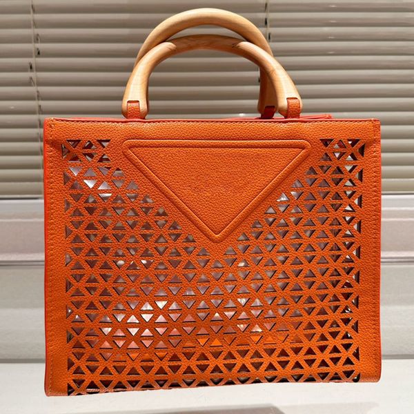 hollow tote bag cut out handbags genuine leather large capacity shopping bags wooden handle fashion letter triangle decor gold hardware
hollow tote bag cut out handbags genuine leather large capacity shopping bags wooden handle fashion letter triangle decor gold hardware