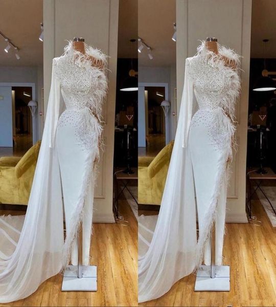 beaded long sleeve white mermaid evening dresses 2020 high split feather formal prom gowns robe de soiree abendkleider6320654, Black;red
beaded long sleeve white mermaid evening dresses 2020 high split feather formal prom gowns robe de soiree abendkleider6320654, Black;red