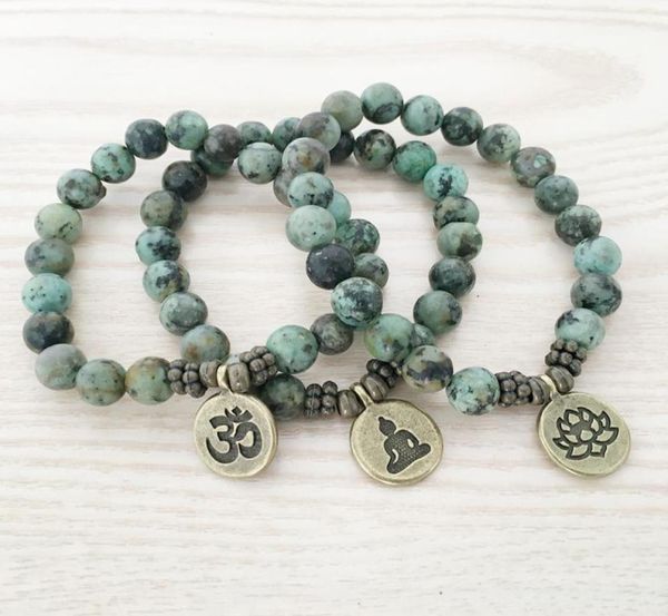 sn1109 natural african turquoise mens bracelet ohm lotus buddha charm bracelet jewelry whole 1772093, Black
sn1109 natural african turquoise mens bracelet ohm lotus buddha charm bracelet jewelry whole 1772093, Black