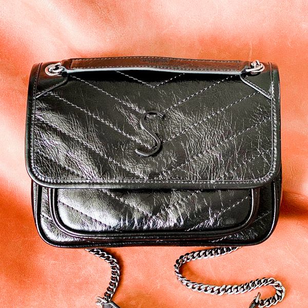 genuine leather niki women totes clutch bags summer with classic shoulder underarm bags straps luxurys designer men messenger cross body tra
genuine leather niki women totes clutch bags summer with classic shoulder underarm bags straps luxurys designer men messenger cross body tra