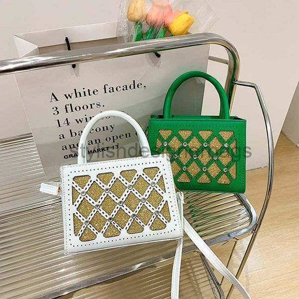 simple handheld bag 2023 autumn/winter new personalized rivet casual small square hollow out one crossbody bagstylishdesign
simple handheld bag 2023 autumn/winter new personalized rivet casual small square hollow out one crossbody bagstylishdesign