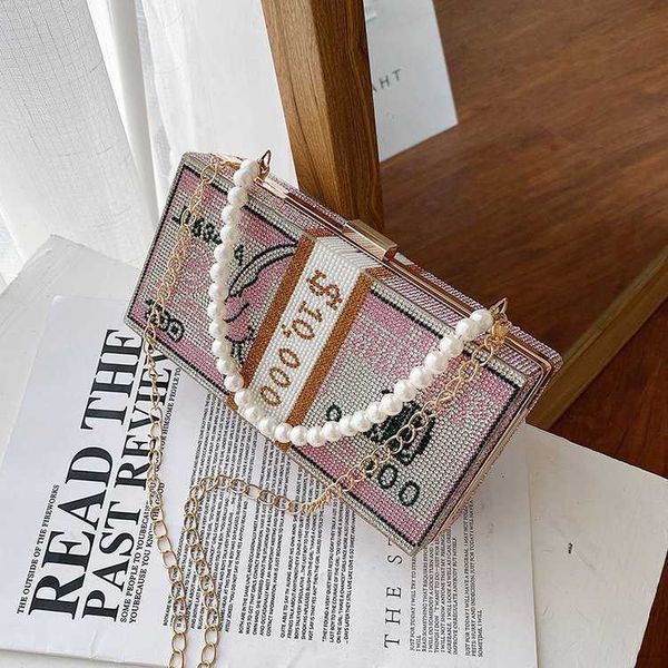 new fashion creative personality inlaid diamond dollar figure pearl chain hand bag lady s foreign style messenger 230804
new fashion creative personality inlaid diamond dollar figure pearl chain hand bag lady s foreign style messenger 230804