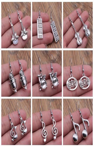charm musical jewelry earrings musical note microphone drum guitar violin shaped dangle drop earrings for girls women5862823, Golden
charm musical jewelry earrings musical note microphone drum guitar violin shaped dangle drop earrings for girls women5862823, Golden