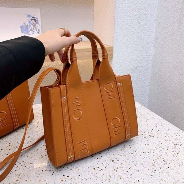 quality luxury designer woody totes shopping bags high-quality canvas handbag crossbody bags luxury shoulder bags travel beach bag wallet pu
quality luxury designer woody totes shopping bags high-quality canvas handbag crossbody bags luxury shoulder bags travel beach bag wallet pu