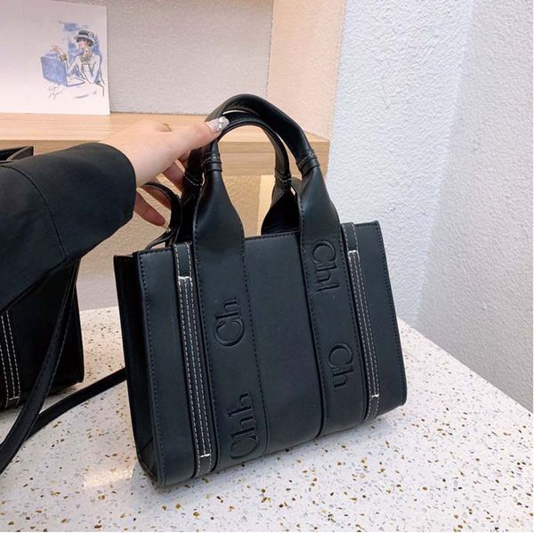 luxury designer woody totes shopping bags canvas handbag crossbody bags luxury shoulder bags travel beach bag wallet purses bags m1
luxury designer woody totes shopping bags canvas handbag crossbody bags luxury shoulder bags travel beach bag wallet purses bags m1