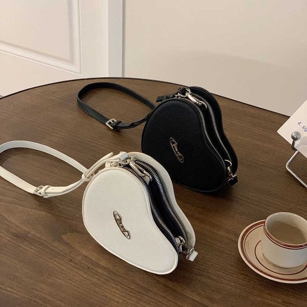black mini bag for women s crossbody purse vivi love heart bag small designer shoulder bags 2023 new high sense handbag 230805
black mini bag for women s crossbody purse vivi love heart bag small designer shoulder bags 2023 new high sense handbag 230805