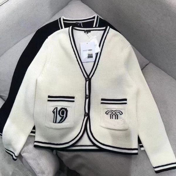 designer v-neck women's knitted sweater high version cardigan sweater jacket, White;black
designer v-neck women's knitted sweater high version cardigan sweater jacket, White;black
