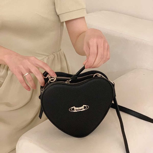 black mini bag for women s crossbody purse vivi love heart bag small designer shoulder bags 2023 new high sense handbag 230805
black mini bag for women s crossbody purse vivi love heart bag small designer shoulder bags 2023 new high sense handbag 230805