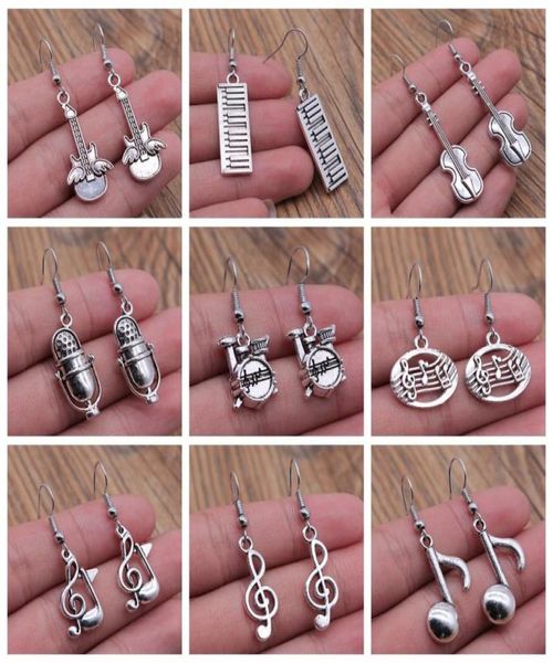 charm musical jewelry earrings musical note microphone drum guitar violin shaped dangle drop earrings for girls women7245692, Golden
charm musical jewelry earrings musical note microphone drum guitar violin shaped dangle drop earrings for girls women7245692, Golden