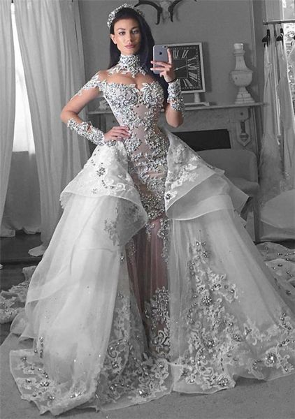 glamorous long sleeves rhinestone mermaid wedding dresses with detachable train dubai high neck bride dresses overskirt tiered bri7256705, White
glamorous long sleeves rhinestone mermaid wedding dresses with detachable train dubai high neck bride dresses overskirt tiered bri7256705, White