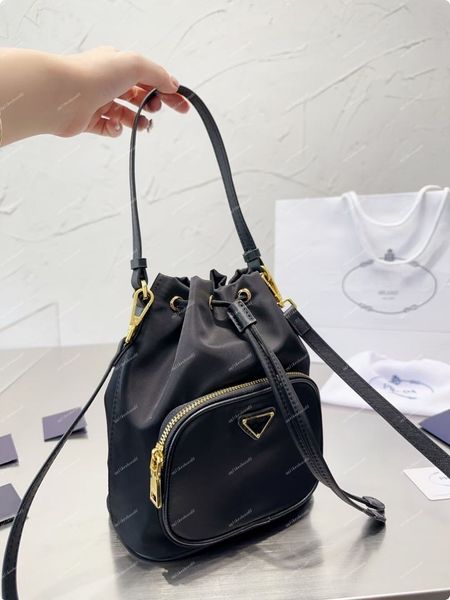 designer duet re-nylo women crossbody bags bucket drawstring shoulders bag ladies messenger satchel chain shoulder purses with triangle mark
designer duet re-nylo women crossbody bags bucket drawstring shoulders bag ladies messenger satchel chain shoulder purses with triangle mark