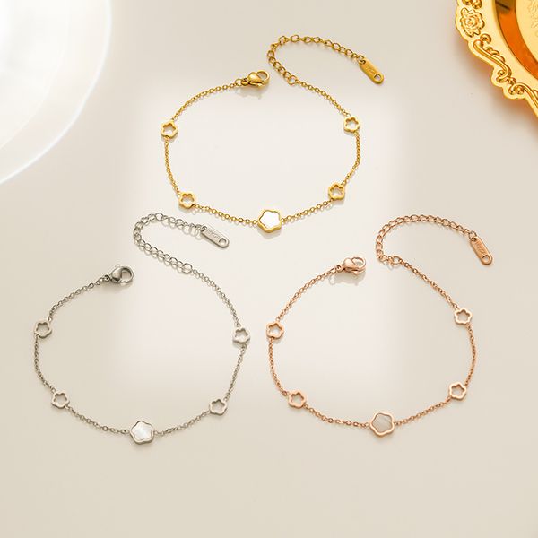 new popular 5 leaf white shell flower charm bracelet jewelry for women gift, Golden;silver
new popular 5 leaf white shell flower charm bracelet jewelry for women gift, Golden;silver