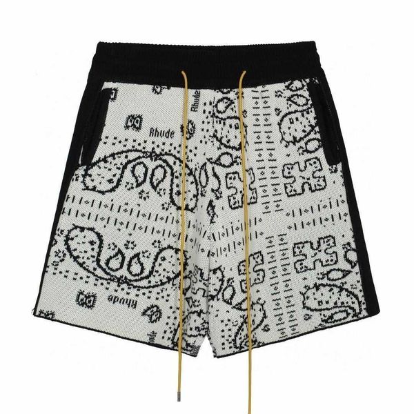 high version rhude summer new white cashew flower drawstring wool shorts with a five point pant trend for men and women couples, White;black
high version rhude summer new white cashew flower drawstring wool shorts with a five point pant trend for men and women couples, White;black