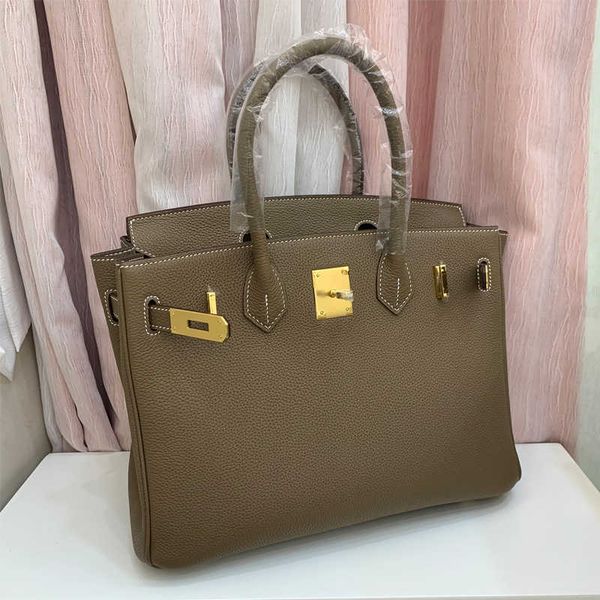 original h ermes brikiss tote bags wholesale 2023 new layer cowhide litchi pattern bag togo leather womens handbag one shoulder crossbody wi
original h ermes brikiss tote bags wholesale 2023 new layer cowhide litchi pattern bag togo leather womens handbag one shoulder crossbody wi