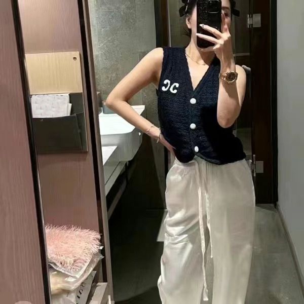 vintage v-neck knitted women's vest 2023 summer embroidered cardigan sleeveless designer trend vest, White
vintage v-neck knitted women's vest 2023 summer embroidered cardigan sleeveless designer trend vest, White