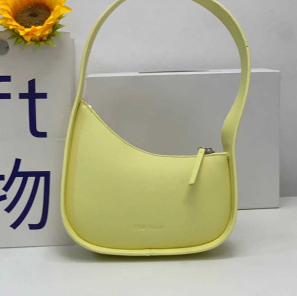 the row half moon bag in smooth leather womens designer with flat shoulder strap and curved zipper closure clutch suded lining underarm bag
the row half moon bag in smooth leather womens designer with flat shoulder strap and curved zipper closure clutch suded lining underarm bag