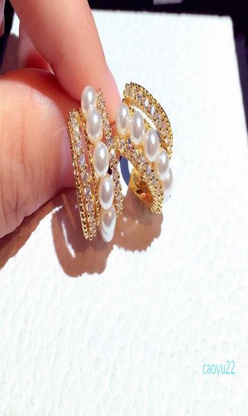 fashion designer half circular geometric pearl stud earrings for women girls with super glittering zircon diamond crystal7289505, Golden;silver
fashion designer half circular geometric pearl stud earrings for women girls with super glittering zircon diamond crystal7289505, Golden;silver