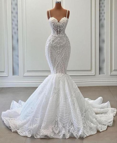 fancy pearls mermaid wedding dresses lace appliques spaghetti straps bridal gown custom made sleeveless new design wedding gowns1752795, White
fancy pearls mermaid wedding dresses lace appliques spaghetti straps bridal gown custom made sleeveless new design wedding gowns1752795, White