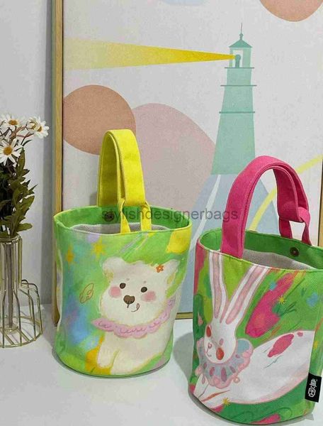 2023 spring/summer new personalized graffiti large capacity handheld bucket canvas bag contrast color bento lunch box bagstylishdesignerbags
2023 spring/summer new personalized graffiti large capacity handheld bucket canvas bag contrast color bento lunch box bagstylishdesignerbags