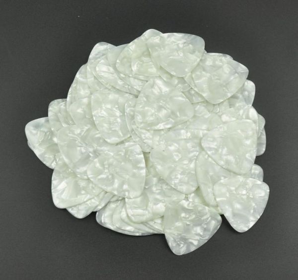 100pcs heavy 096mm celluloid rounded triangle guitar picks plectrums pearl white3467085
100pcs heavy 096mm celluloid rounded triangle guitar picks plectrums pearl white3467085