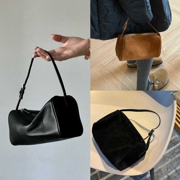 the row bag designer suede penholder reverse 90s mini simple handbag leather female premium touch bag fashion leisure
the row bag designer suede penholder reverse 90s mini simple handbag leather female premium touch bag fashion leisure