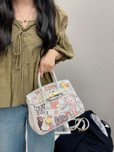 h ermes fashion brikis's handbags for sale graffiti bag high grade women 2023 new fashion women's handbag messenger with real logo
h ermes fashion brikis's handbags for sale graffiti bag high grade women 2023 new fashion women's handbag messenger with real logo