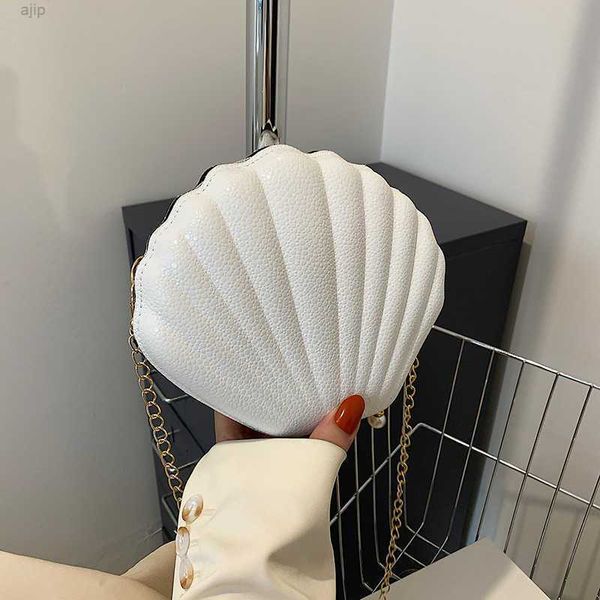 fashion shell design crossbody bag summer beach chain shoulder small clutch for women fashionable decoration
fashion shell design crossbody bag summer beach chain shoulder small clutch for women fashionable decoration