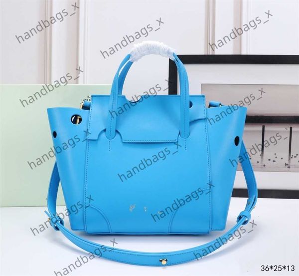 off bag women's tote with iconic hand iconic meter hollow out detail two round handles detachable shoulder strap built-in zipper pocket
off bag women's tote with iconic hand iconic meter hollow out detail two round handles detachable shoulder strap built-in zipper pocket
