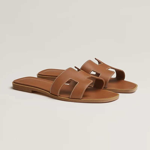 designer beach slipper oran sandals slides h slippers for female summer wear 2023 new fashion flat bottomed women's shoes tourism and 1
designer beach slipper oran sandals slides h slippers for female summer wear 2023 new fashion flat bottomed women's shoes tourism and 1
