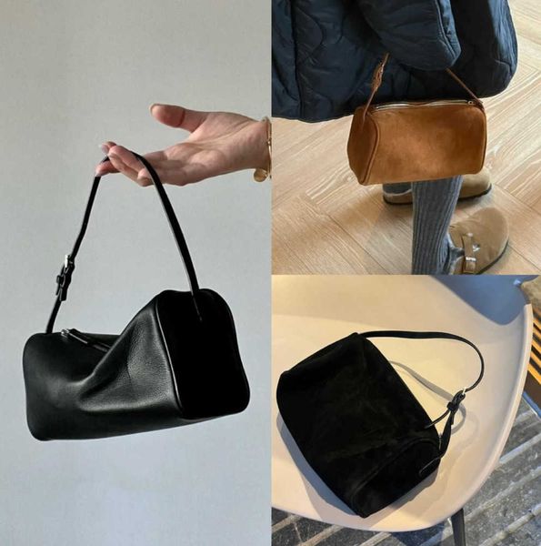 the row bag designer suede penholder reverse 90s mini simple handbag leather female premium touch bag luxury and high sense
the row bag designer suede penholder reverse 90s mini simple handbag leather female premium touch bag luxury and high sense