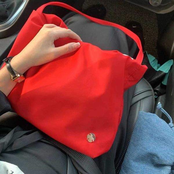 the row nylon cloud bag luxury small group bag large capacity commuter tote bag one shoulder underarm bag for women
the row nylon cloud bag luxury small group bag large capacity commuter tote bag one shoulder underarm bag for women